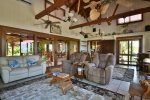 Living room with vaulted ceilings and  beach views